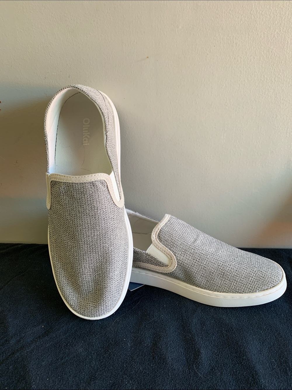 OluKai Pehuea Slip-On Sneakers in Taupe and Cream